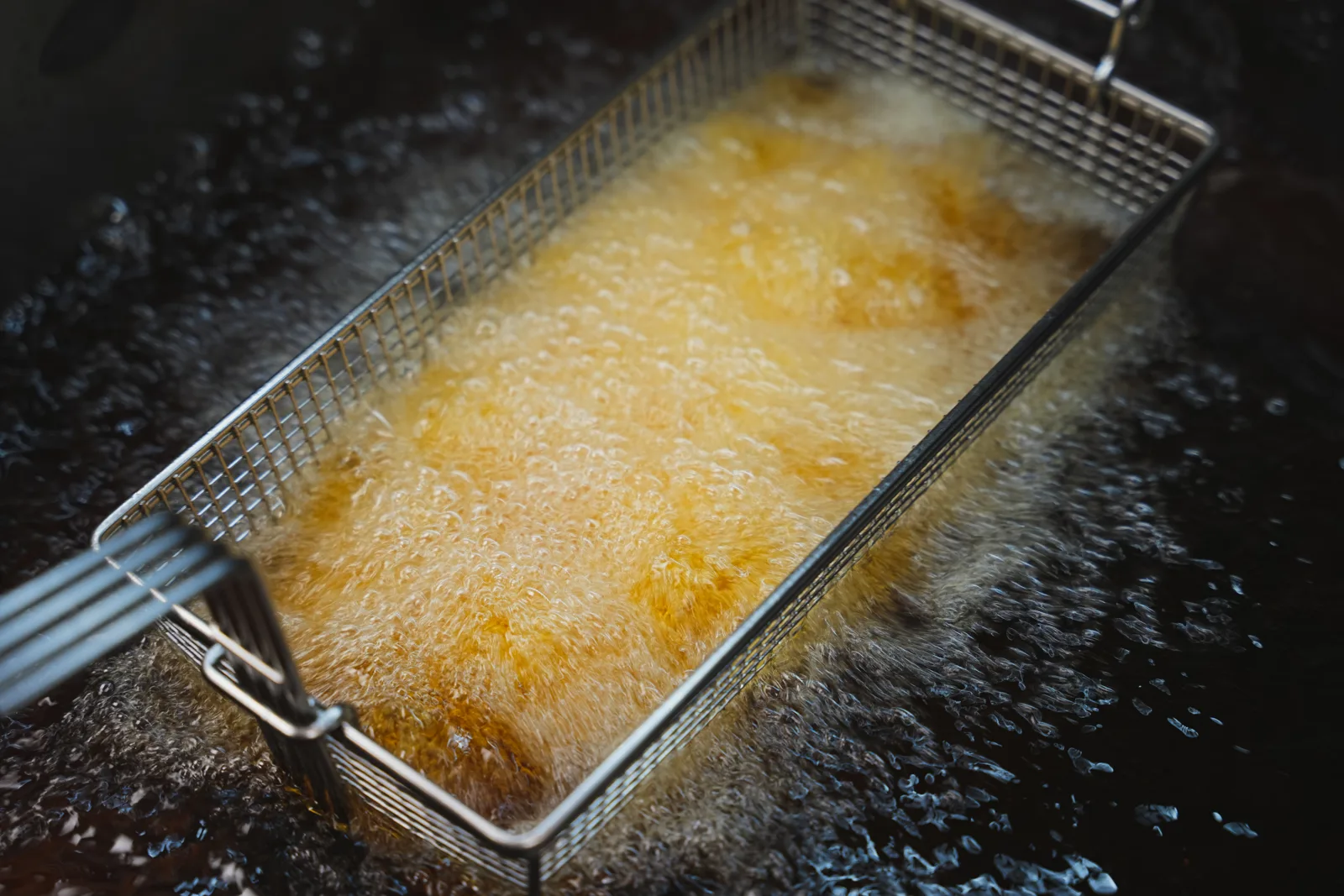 Chips frying in the basket
