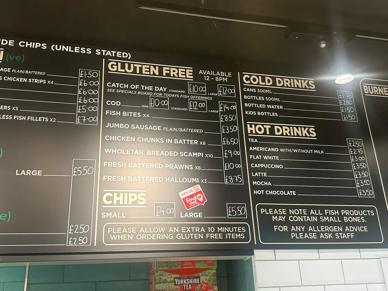 The gluten free section of the menu board