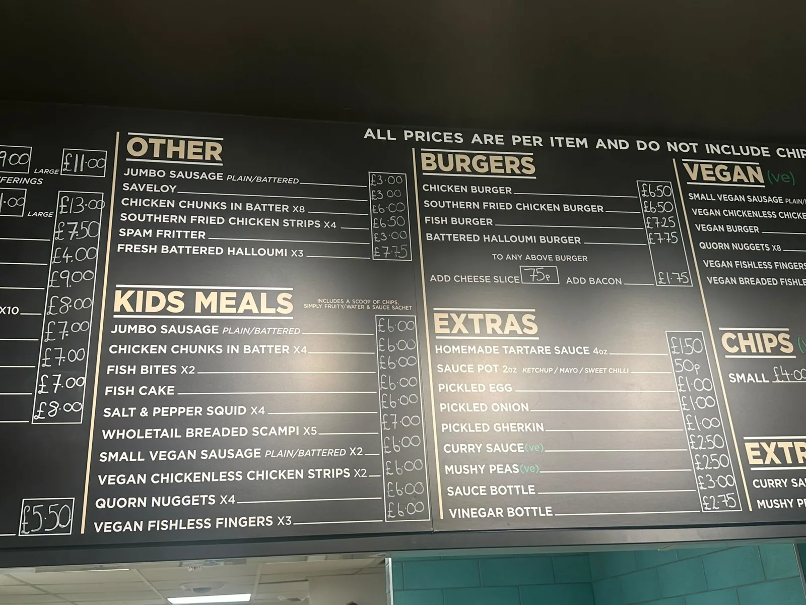 Kids meals, vegan options and burgers on the menu board